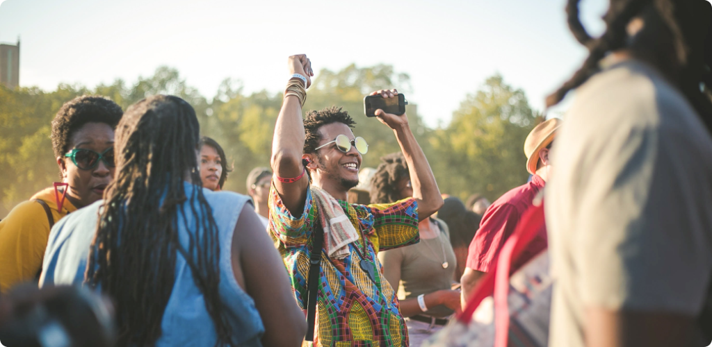 Photo of a man enjoying a festival
